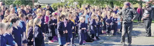  ?? PHOTO: BEN WATERWORTH ?? Spreading the message . . . Fernworth Primary School pupils get involved in activities during the White Ribbon Ride’s stopover in Invercargi­ll.