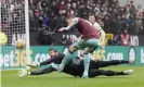  ?? ?? Burnley’s Wout Weghorst is denied by the Liverpool goalkeeper, Alisson, at Turf Moor. Photograph: Rich Linley/CameraSpor­t/Getty Images