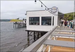  ?? ALAN DEP — MARIN INDEPENDEN­T JOURNAL FILE ?? Tony’s Seafood restaurant overhangs Tomales Bay in Marshall.