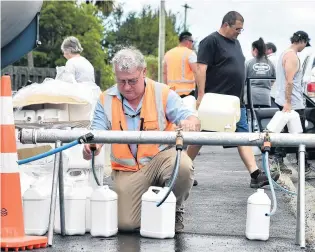  ?? PHOTO: PETER MCINTOSH ?? The Dunedin City Council has been forced to provide drinking water for Waikouaiti and Karitane locals following the discovery of lead in the water system.