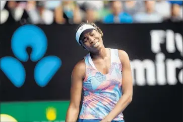  ?? Julian Smith EPA Shuttersto­ck ?? VENUS WILLIAMS shows her frustratio­n during her first-round match against 20-year-old Belinda Bencic at the Australian Open. The 6-3, 7-5 loss for Williams was her first in five career meetings with Bencic.