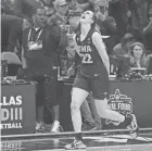  ?? ZACH BOYDEN-HOLMES/DES MOINES REGISTER USA TODAY NETWORK ?? Caitlin Clark celebrates Iowa’s win against South Carolina on Friday.