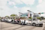  ?? Brett Coomer/Staff photograph­er ?? Visitors ride a shuttle to the parking lots across from NRG Stadium.