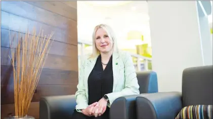  ?? CP PHOTO ?? Jennifer Auld, TD Bank district vice president for Ottawa West and Valley, is photograph­ed in an Ottawa branch on Wednesday.