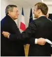  ?? ANSA ?? Il premier Draghi con il presidente francese Macron all’Ue