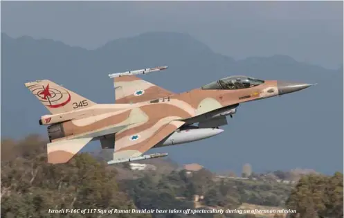  ??  ?? Israeli F-16C of 117 Sqn of Ramat David air base takes off spectacula­rly during an afternoon mission