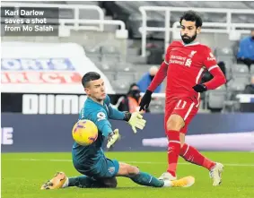  ??  ?? Karl Darlow saves a shot from Mo Salah