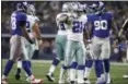 ?? RON JENKINS — THE ASSOCIATED PRESS ?? Dallas Cowboys running back Ezekiel Elliott ( 21) gestures “feed zeke” after a run for first a first down in the second half of an NFL football game a against the New York Giants on Sunday in Arlington, Texas.