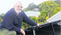  ?? PHOTO: LUISA GIRAO ?? Harnessing energy . . . Stewart Island’s Sails Ashore lodge owner Peter Tait has spent large on solar panels and batteries and he is pleased with his decision.