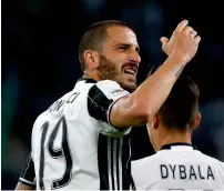  ?? — AFP ?? Juventus’ defender Leonardo Bonucci celebrates after scoring against Genoa on Sunday.