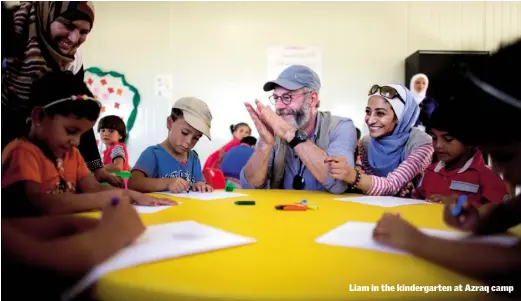  ??  ?? Liam in the kindergart­en at Azraq camp