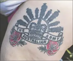  ??  ?? Brigette has a permanent reminder of her service – a tattoo depicting The Australian Army’s Rising Sun insignia