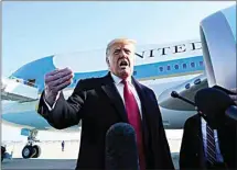  ?? ALEX BRANDON / AP ?? President Donald Trump speaks to the media Tuesday before boarding Air Force One at Andrews Air Force Base, Md., to travel to Texas.