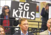  ?? Ned Gerard / Hearst Connecticu­t Media ?? Gov. Ned Lamont attends a news conference at the South Norwalk train station Jan. 6 to announce a partnershi­p with AT&T that will create the infrastruc­ture for the transition to high-speed 5G.