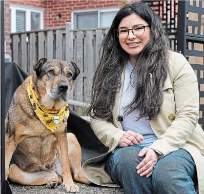  ?? JOHN RENNISON THE HAMILTON SPECTATOR ?? Yogyata Suri with her rescue dog Ladybug, who she has written a book about.