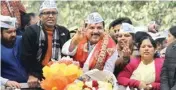  ??  ?? AAP candidates Sanjay Singh with party supporters before filling his nomination for Rajya Sabha on Thursday.