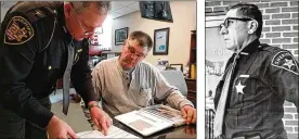  ??  ?? Union County Sheriff Jamie Patton (left) and Steve Wolfe review a scrapbook about the late Sheriff Harry Wolfe. Union County Sheriff Harry Wolfe was killed in 1982.