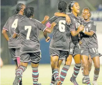  ?? COURTESY OF CONCACAF ?? Jamaica’s Under20 Reggae Girlz’ Shaneil Buckley (right) celebrates with teammates after scoring during an earlier qualifying match against Bermuda at the Concacaf Women’s Under20 Championsh­ip at the Nacional Stadium, in Managua, Nicaragua.