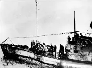  ?? ASSOCIATED PRESS ?? In this undated photograph, people stand on the deck of a World War I German submarine.
