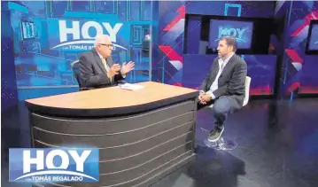  ?? Mega TV ?? Former Miami Mayor Tomas Regalado, left, hosts a current-affairs program on weekends on Mega TV.