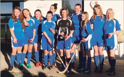  ??  ?? Dunadd ladies celebrate being crowned Marine Harvest South Division 2 champions.