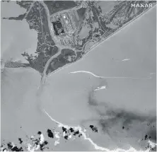  ?? MAXAR TECHNOLOGI­ES VIA AP ?? An aerial view of Port Fourchon, Louisiana, shows oil slicks from a sizable oil spill in the Gulf of Mexico following Hurricane Ida.