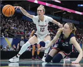  ?? ERIC GAY — THE ASSOCIATED PRESS ?? Stanford's Lexie Hull, left, and UConn's Paige Bueckers go after a loose ball during the NCAA tournament's Final Four.