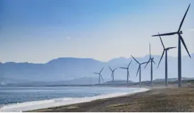  ?? ?? Wind turbines along the coast of northern Philippine­s.