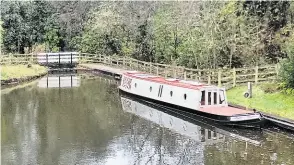  ?? PHOTO: MALCOLM BRIDGE. ?? Electric boat Ampere seen here at Froghall.