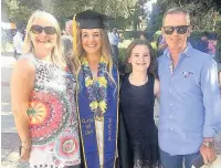  ??  ?? ●●Bramhall golf star Bronte Law graduating with her family
