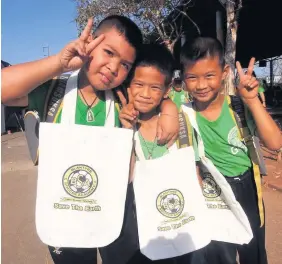  ??  ?? Delighted Pupils at the Good Child Foundation with their new bags