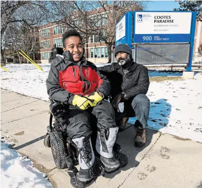  ?? JOHN RENNISON THE HAMILTON SPECTATOR ?? Nine-year-old Mutasim Saeed, who is known as Sumi, with his dad Mutaz Arbab. Arbab had to pick up his son from school early because there were not enough EAs to support him.