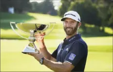 ?? Associated Press ?? Dustin Johnson took an advantage into the Tour Championsh­ip and led wire- to- wire for the win Monday.