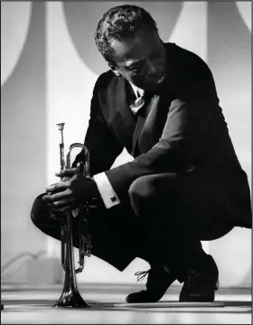  ?? (AP) ?? This photo of Miles Davis taken in 1964 at the Monterey Jazz Festival is from the book Monterey Jazz Festival:40 Legendary Years.