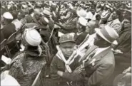  ?? PHOTO COURTESY OF YALE ART GALLERY ?? Lee Friedlande­r’s photo of a Scout and his family at the Prayer Pilgrimage in 1957.