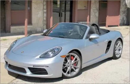  ??  ?? The 2017 Porsche 718 Boxster offers more power and uses less fuel than the previous model, yet is quicker despite using small engines.