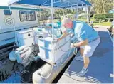  ?? RED HUBER/ STAFF PHOTOGRAPH­ER ?? Business owners who rely on the St. Johns River for boaters, fishermen and tourists, like Captain Bob Wheeler, are returning to normal after Irma.