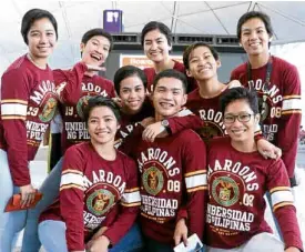  ?? —GERLADINE MADAMBA ?? Members of the UP Pep Squad en route to Japan