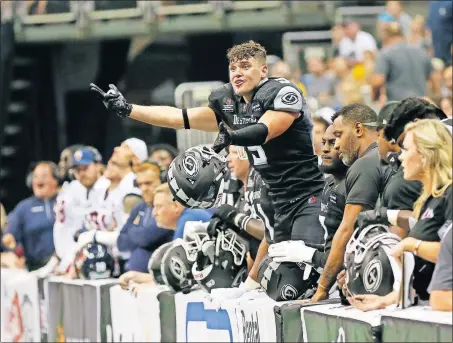  ?? [ADAM CAIRNS/DISPATCH] ?? Destroyers receiver Fabian Guerra appeals his ejection for unsportsma­nlike conduct during the second quarter at Nationwide Arena. Empire defensive back Terrance Smith was also ejected.