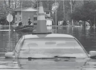  ?? TONY CALDWELL ?? Flooding as shown Thursday in Gatineau, could have been avoided by better planning, including industrial-sized berms and calling in the military earlier, writes Sherry Oake of Ottawa.