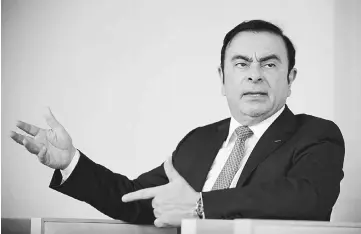  ??  ?? File photo shows Ghosn, chairman of Nissan, speaks during an interview in Yokohama, Japan, in February. More American rental-car lots are looking a lot like the one Arnett encountere­d, which helps explain why Nissan has been an exception among auto...