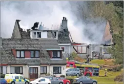  ?? Photograph: Iain Ferguson, The Write Image ?? Firefighte­rs tackle last week’s blaze which gutted two homes in the village of Ardgour.