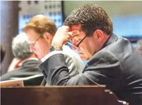  ?? ASSOCIATED PRESS FILE PHOTO ?? State Sen. Mark Green, R-Clarksvill­e, sits at his desk in the Senate chamber in Nashville. Green’s nomination to become President Donald Trump’s secretary of the Army has put the lawmaker’s gubernator­ial campaign in Tennessee on hold.