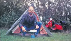  ?? ?? Cooking breakfast after a night ride from Colchester on the Vespa.