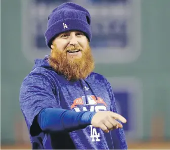  ??  ?? Third baseman Justin Turner and the Dodgers got their first look at Fenway Park on Monday as they gear up for tonight’s World Series opener in Boston.