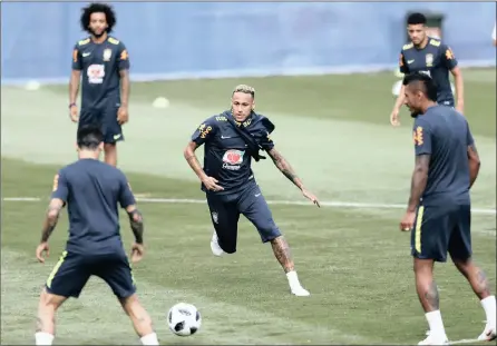  ?? PICTURE: EPA ?? KING PIN: Neymar is put through his paces during Brazil training in Sochi.