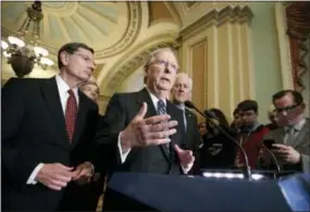  ?? THE ASSOCIATED PRESS ?? Senate Majority Leader Mitch McConnell, R-Ky., joined by, from left, Sen. John Barrasso, R-Wyo., Sen. Roy Blunt, R-Mo., and Majority Whip John Cornyn, R-Texas, speaks with reporters at the Capitol in Washington on Tuesday.