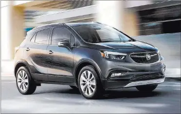  ?? Buick ?? A beautifull­y sculpted front fascia and grille flow smoothly to the rear of the 2018 Encore compact SUV, giving it a sleek, athletic look.