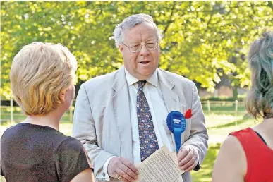  ?? ?? Sir Patrick Cormack (as he was) canvassing in 2005: he was an early advocate of a national lottery to fund the arts and listed ‘fighting philistine­s’ as one of his recreation­s