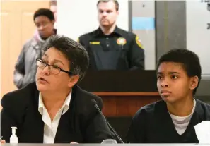  ?? The Associated Press ?? ■ Chrystul Kizer, right, and her attorney Larisa Benitez-Morgan sit together in the Kenosha County Courthouse on Feb. 6, 2020. Kizer, accused of killing a man, can argue at trial that she was justified because he was sexually traffickin­g her, Wisconsin’s Supreme Court ruled Wednesday in a decision that could help define the limits of legal immunity for traffickin­g victims nationwide.